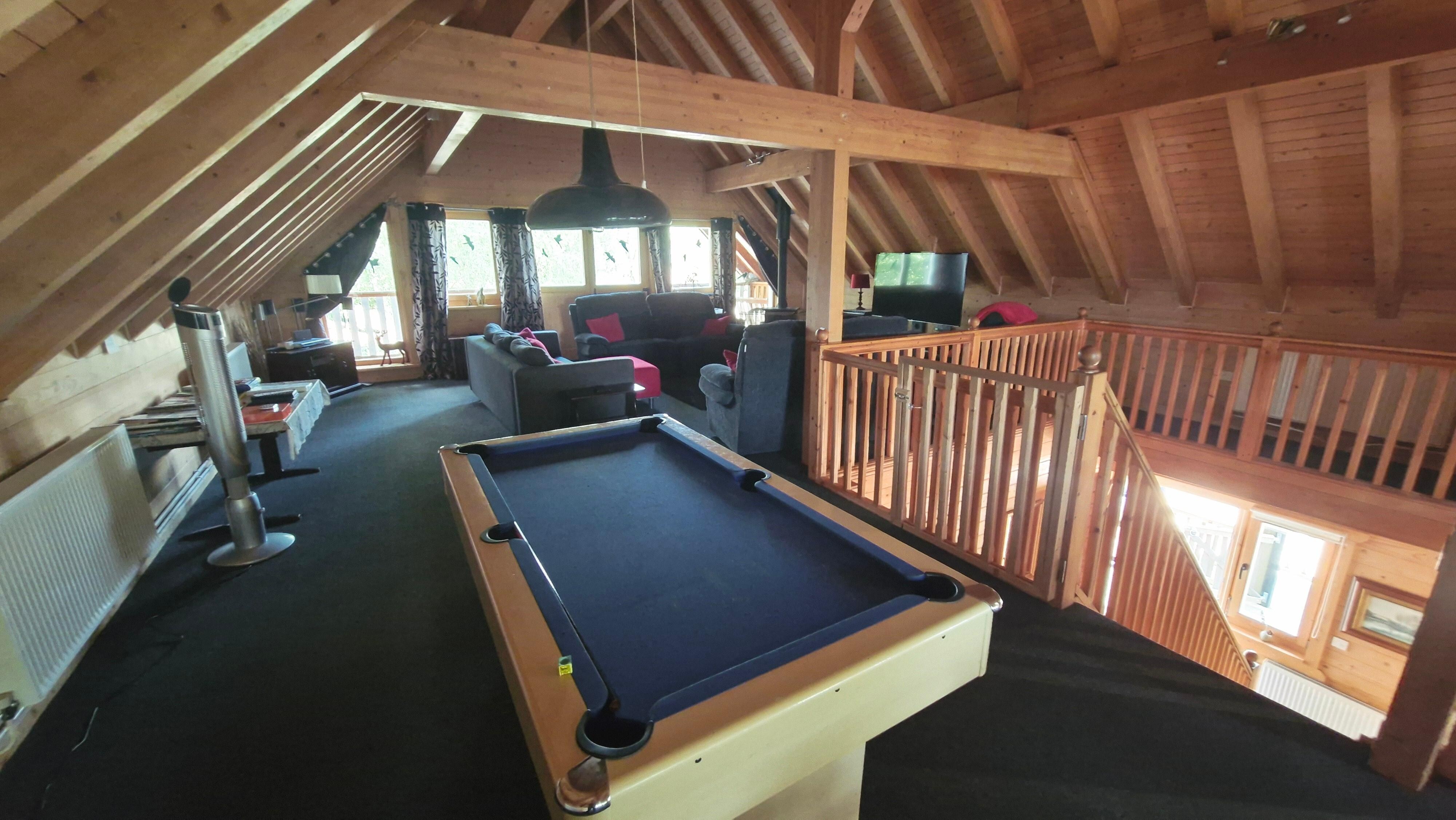 Pool table and living room