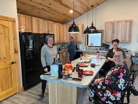 Enjoying breakfast in the kitchen.