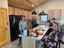 Enjoying breakfast in the kitchen.