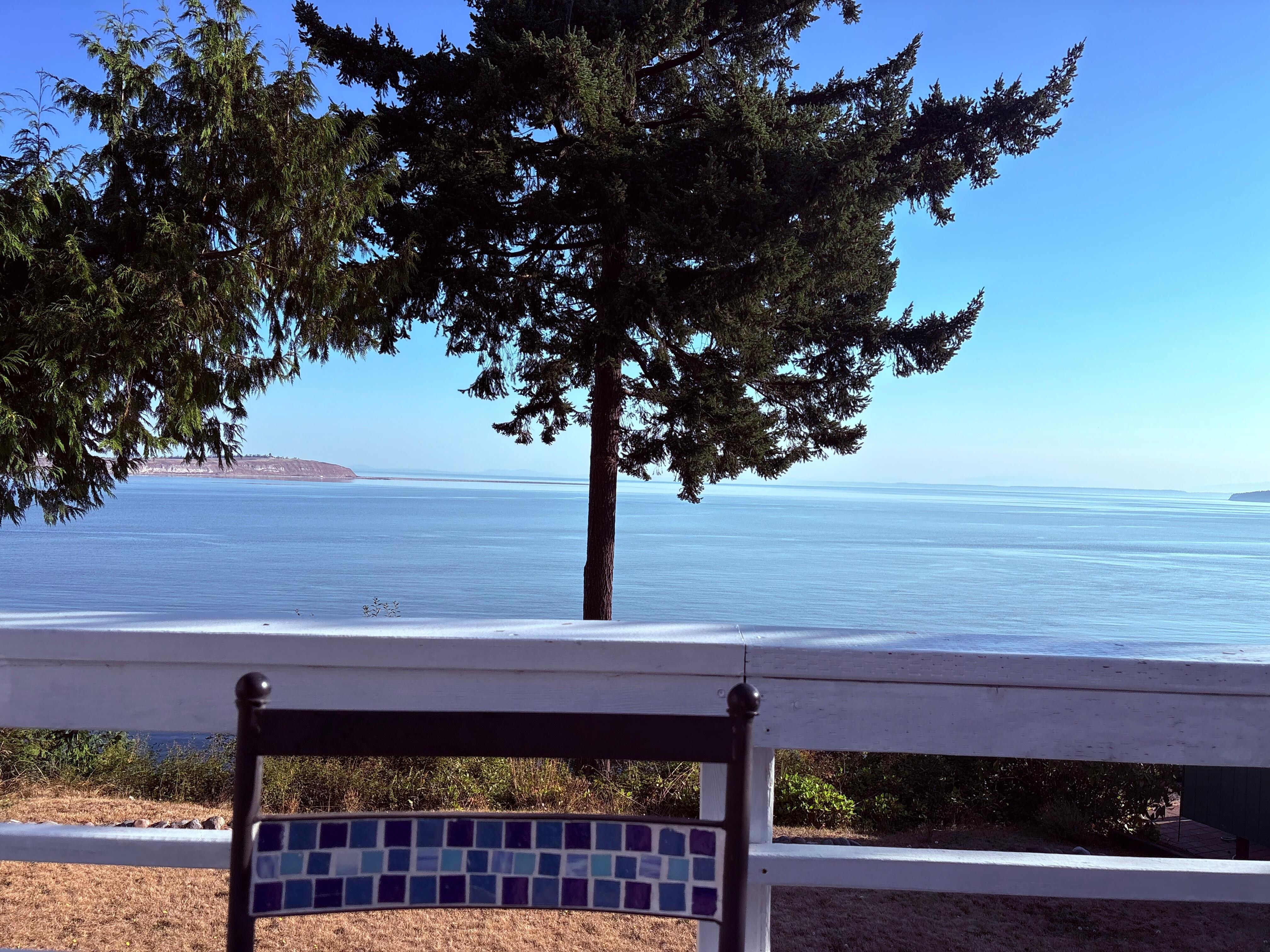 View from deck. The listing photo is better and shows off the sweeping view!