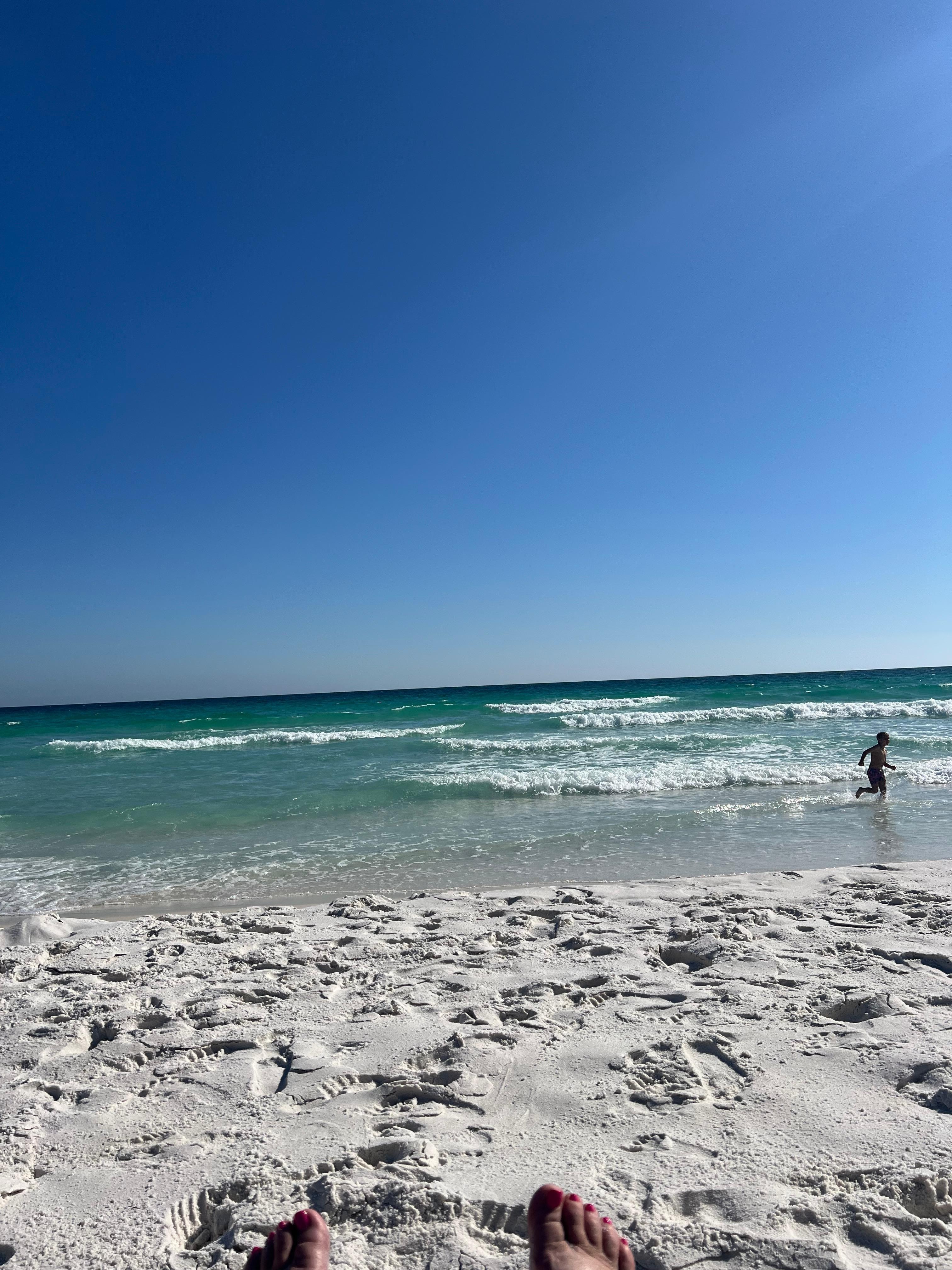 Beach was sandy with no shells. 