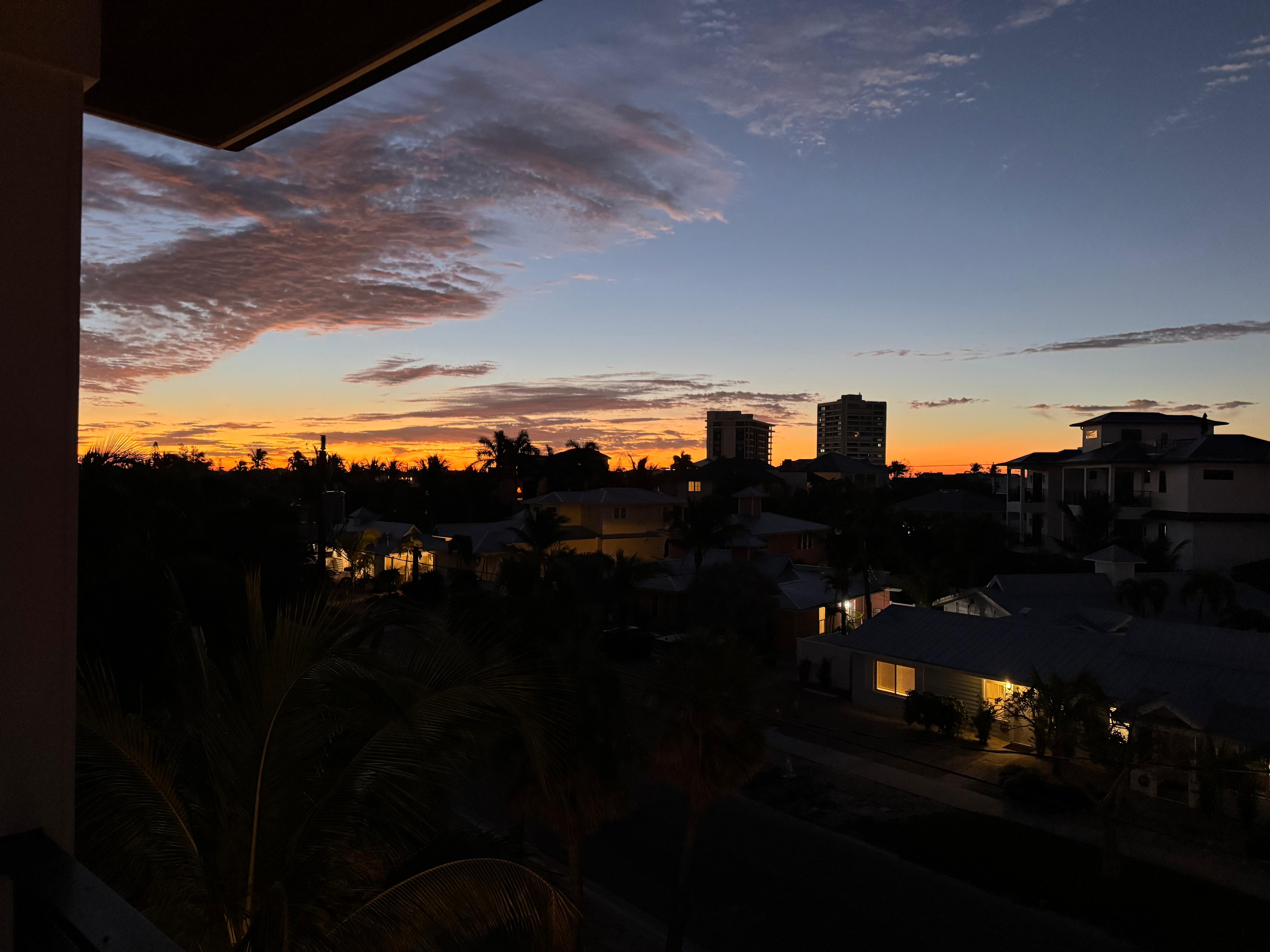 From the third-floor bedroom balcony, Siesta Village at night 