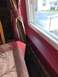 Cobwebs and dust on windows.