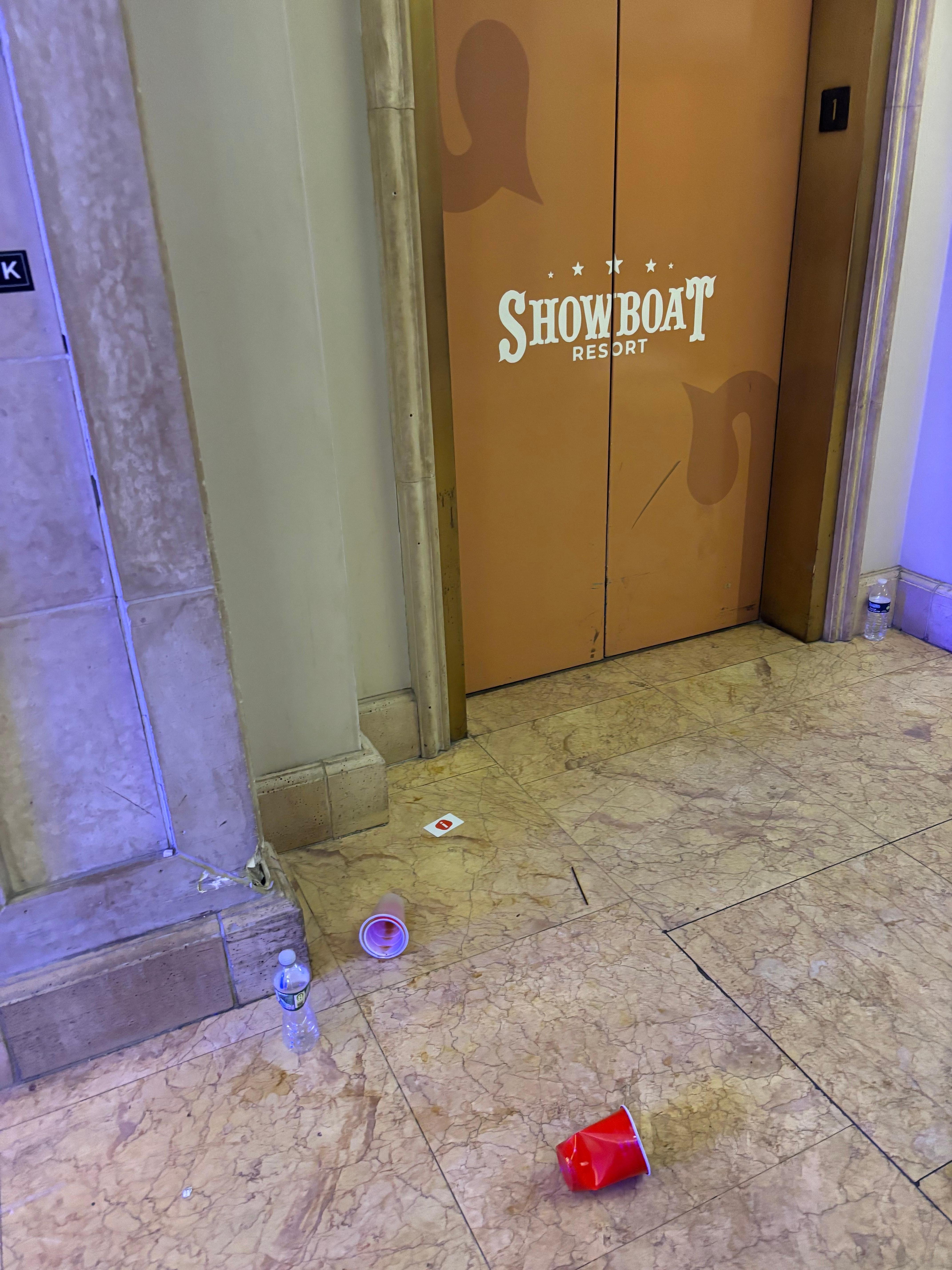 Trash outside elevator from night prior (9am)