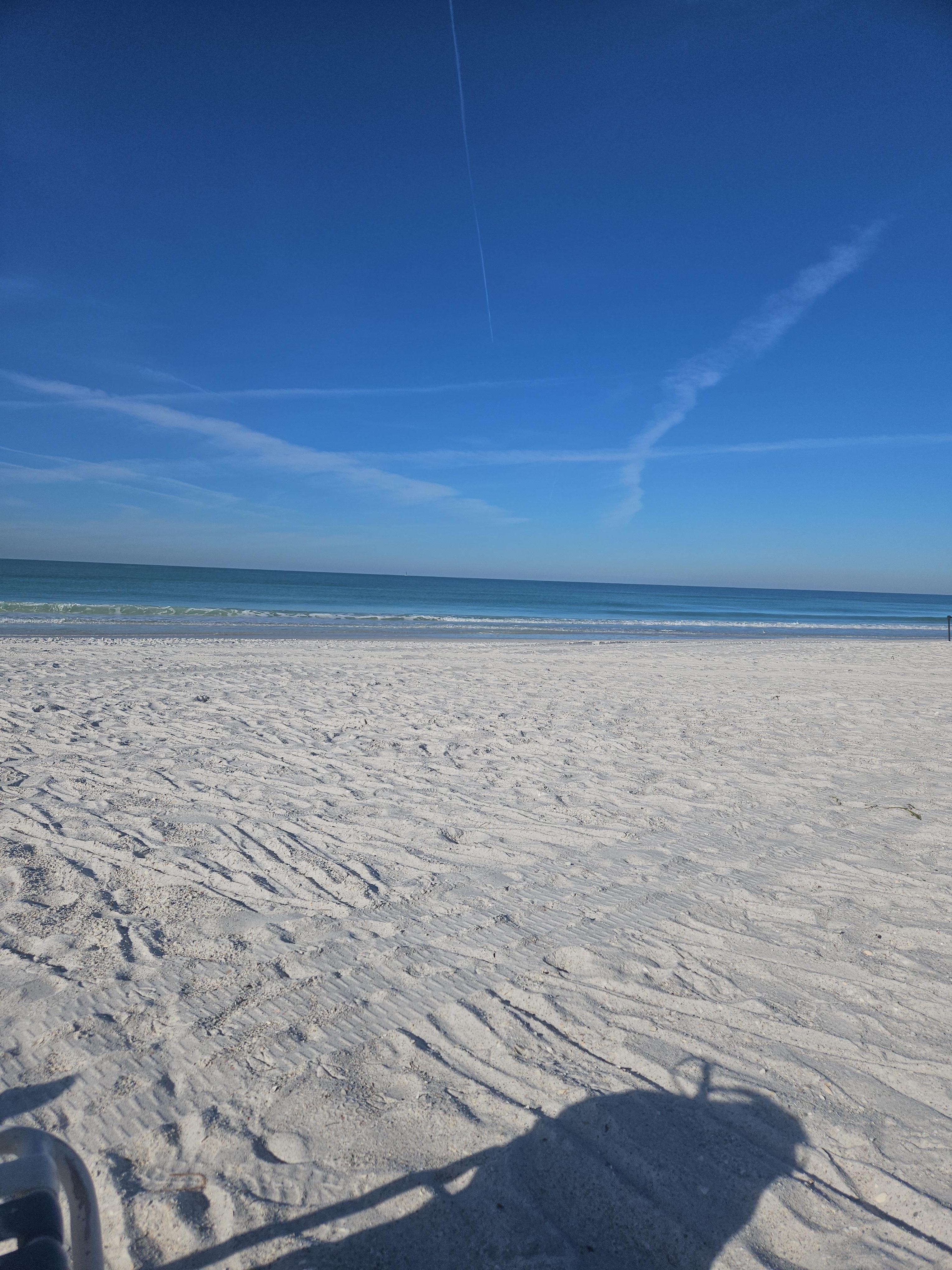 Our view from the beach and the roof top sitting area, which I didn't see prior to booking so that was a nice surprise!
