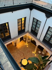 Looking down from our apartment into the interior patio.