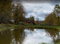 View of the barn from the pond on the property