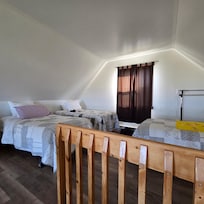 Mezzanine avec trois lits simples