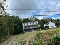 Front of property as we drove by. Better up close!