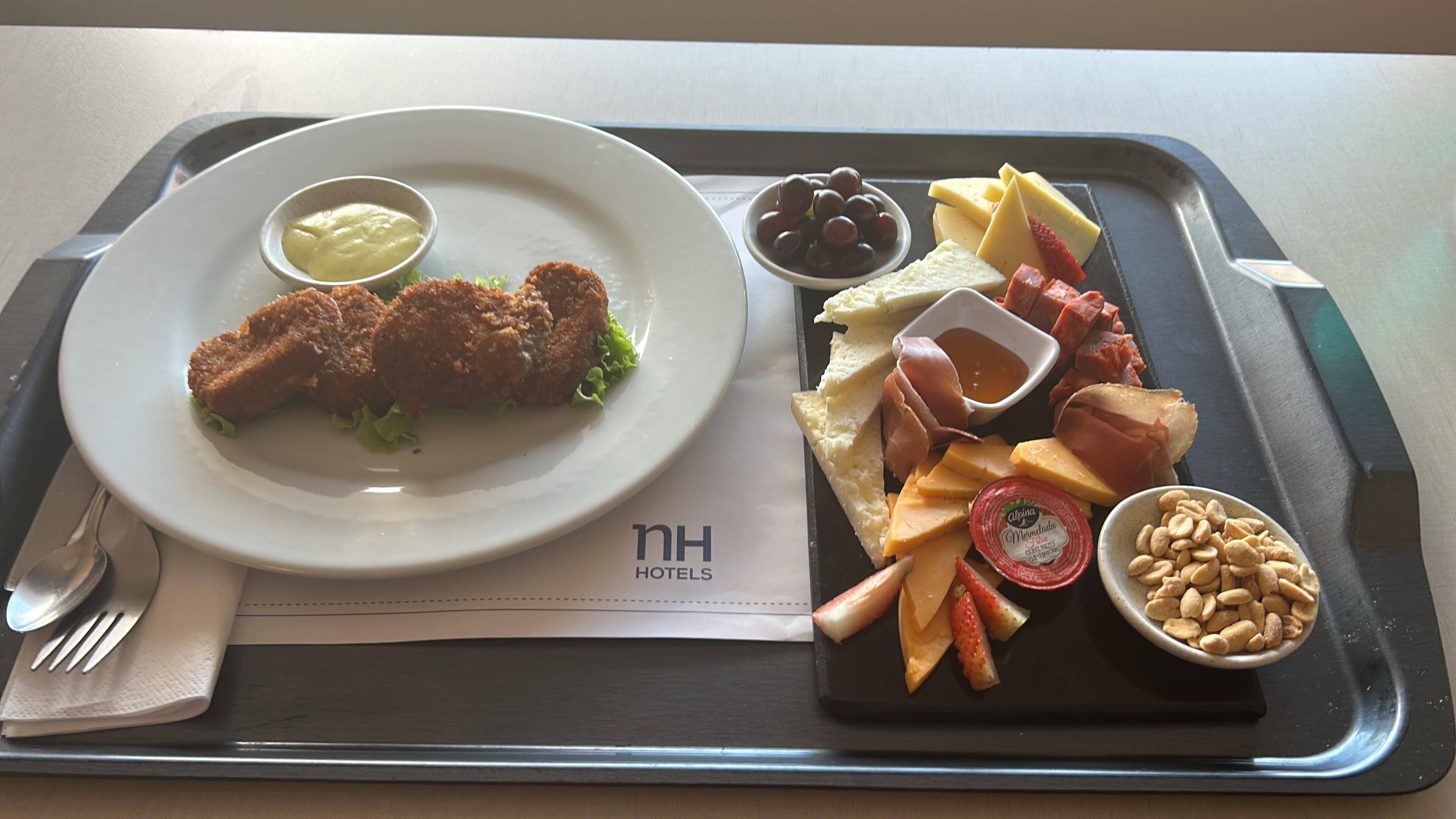 Room service - cheese board and croquets