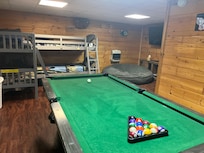 Lower level with a separate bedroom and bathroom walks out to the fire pit and hot tub