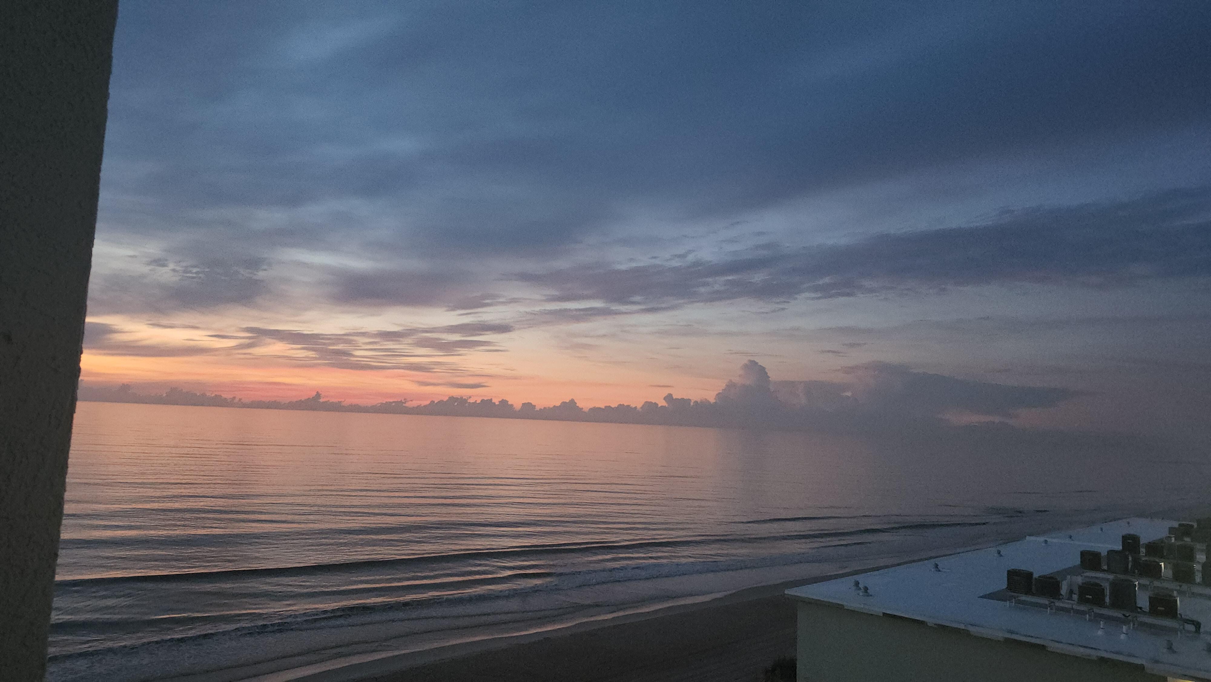 View of sunrise from balcony. 