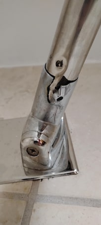 Broken curtain rod in the shower
