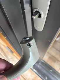 This is part of the door handle from the outside which I contacted the Host within minutes of our arrival. I found the handle like this on the deck.