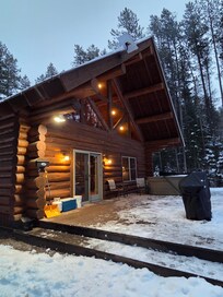 Front entry and hot tub.
