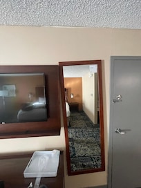 Mirror falling off the wall