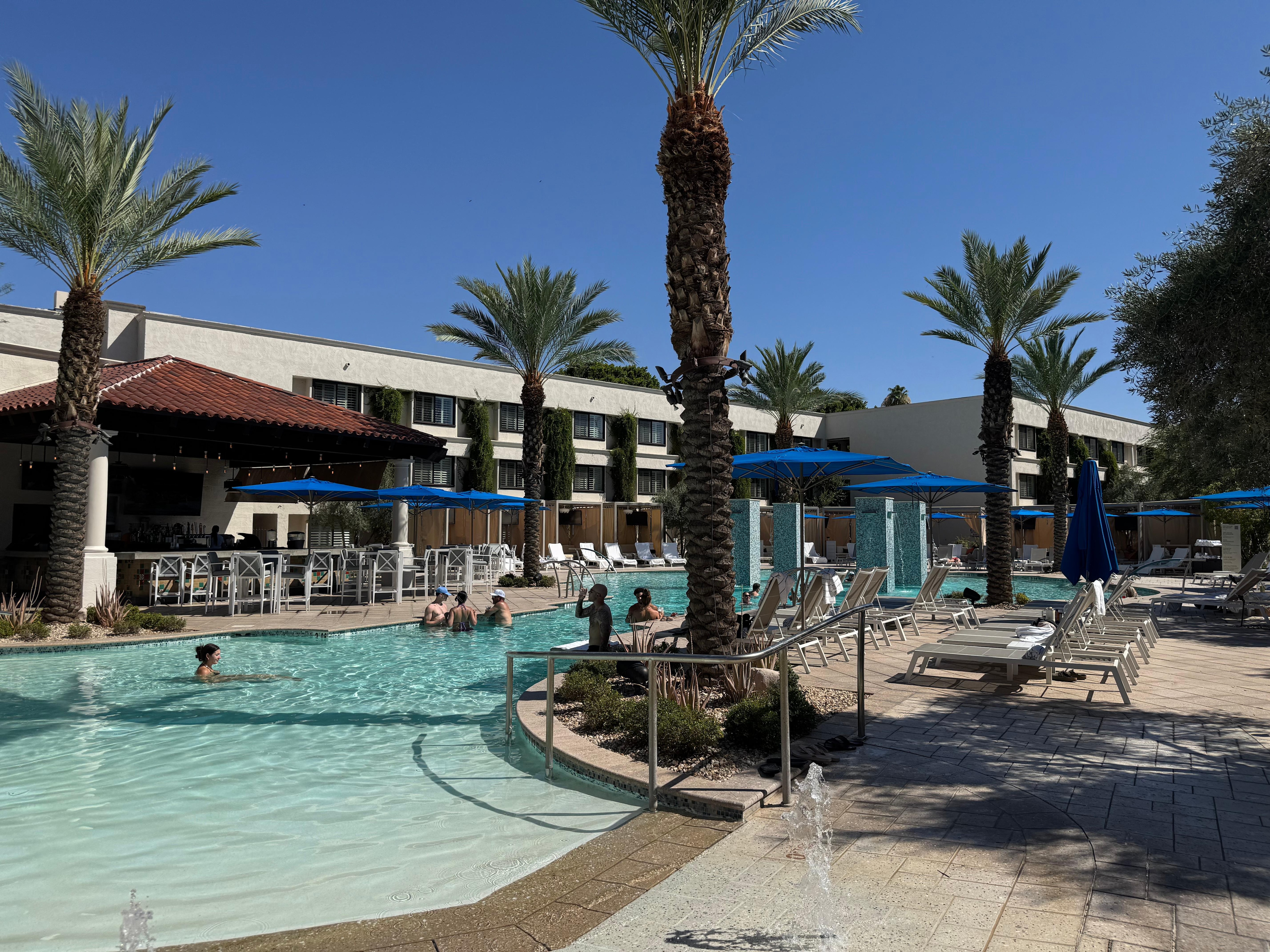 Pool area with cabanas