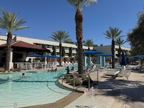 Pool area with cabanas