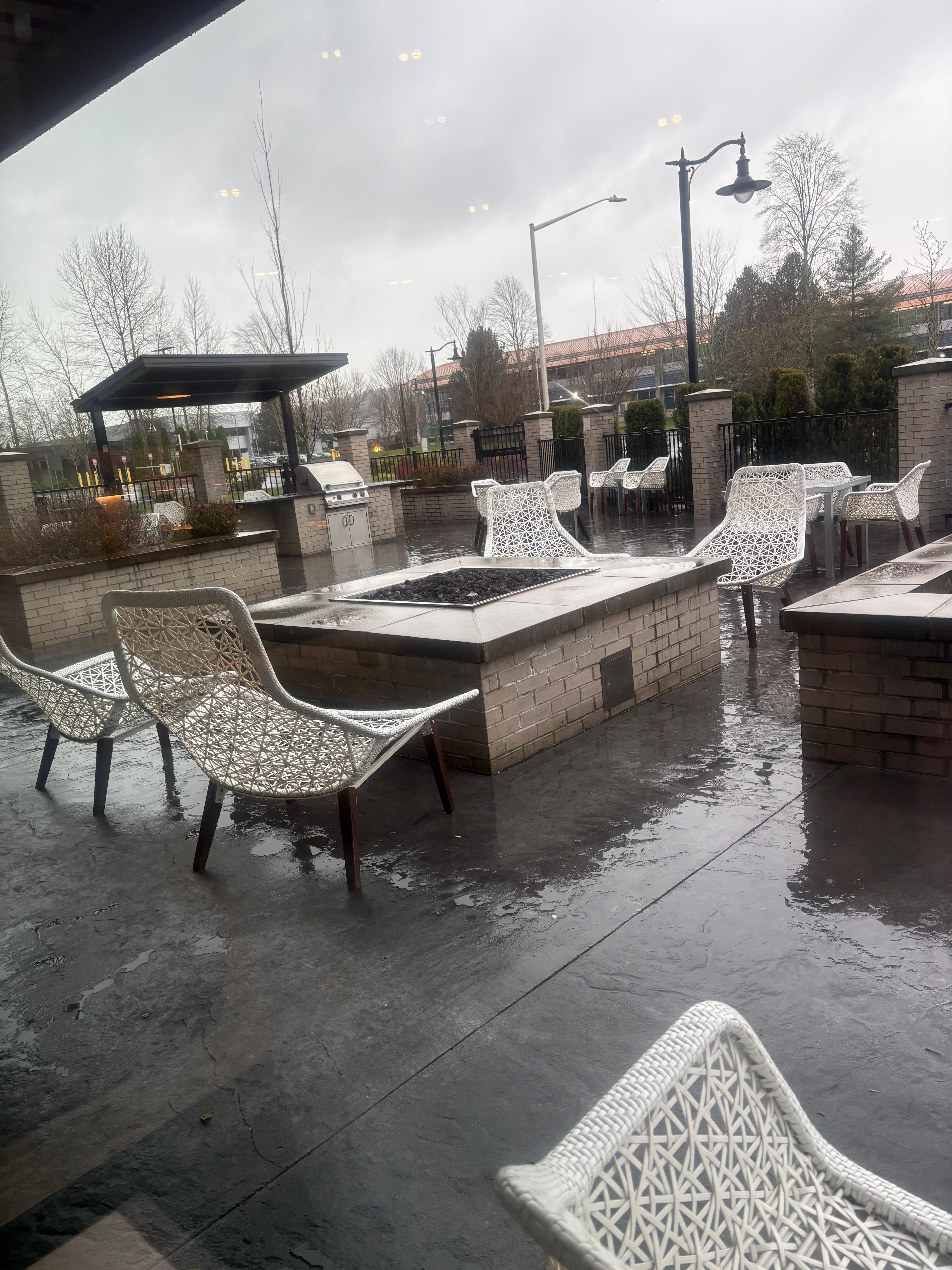 Outside patio with fire pit. It was raining so we didn’t use it, but it looked great! 