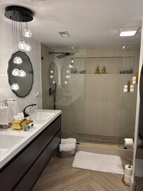 The light fixtures and faucets- so pretty