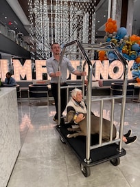 Our dog was afraid of the marble floors so we had to take him up on the baggage cart : ) He got braver and was fine after he warmed up!