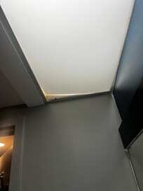 Light fixture/plastic warped and falling out