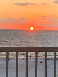 Watching the sun set on the private deck of the penthouse room