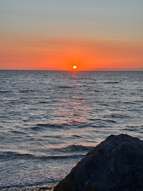 Sunset from beach across road