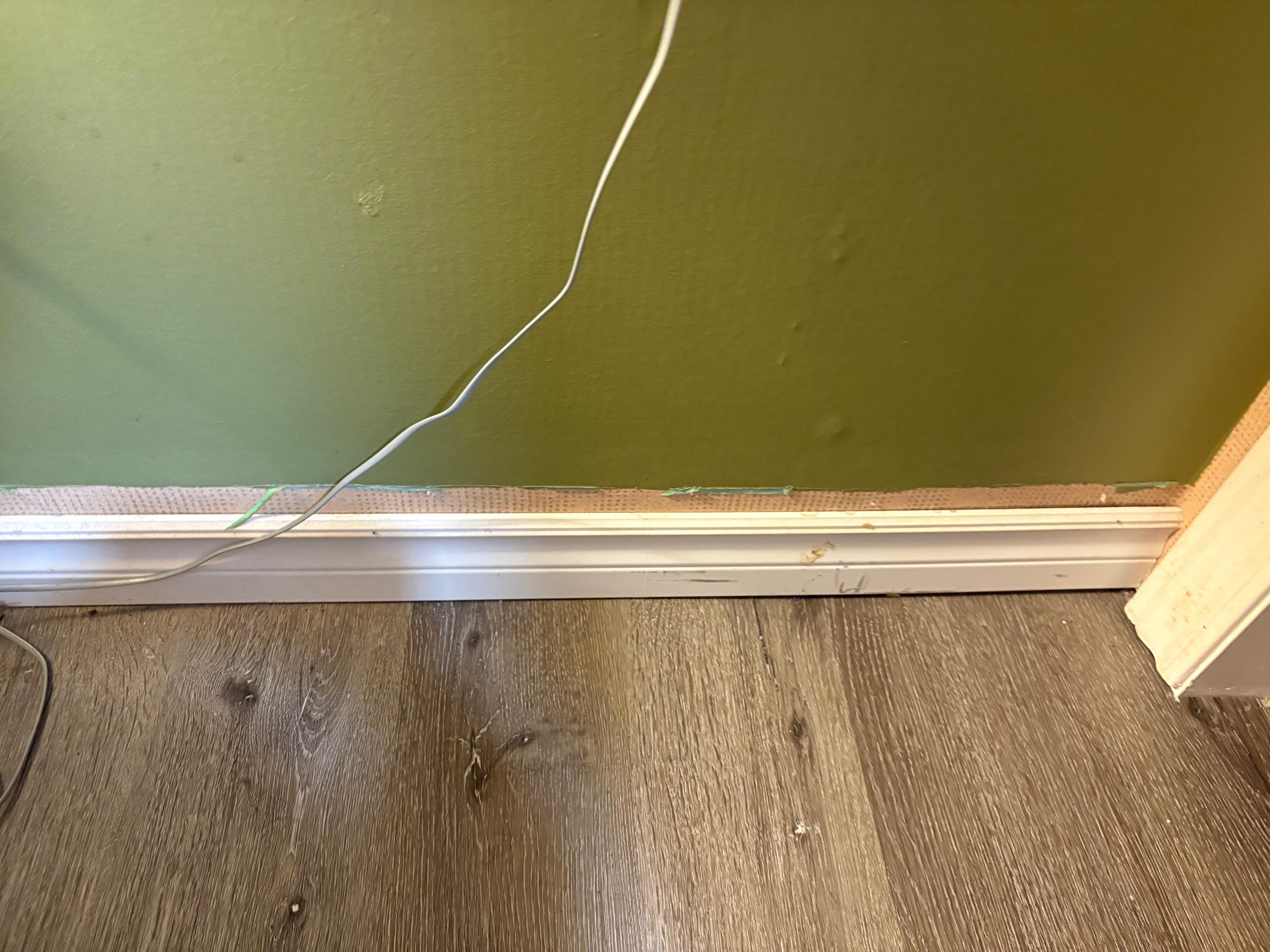 Not painted to top of baseboard