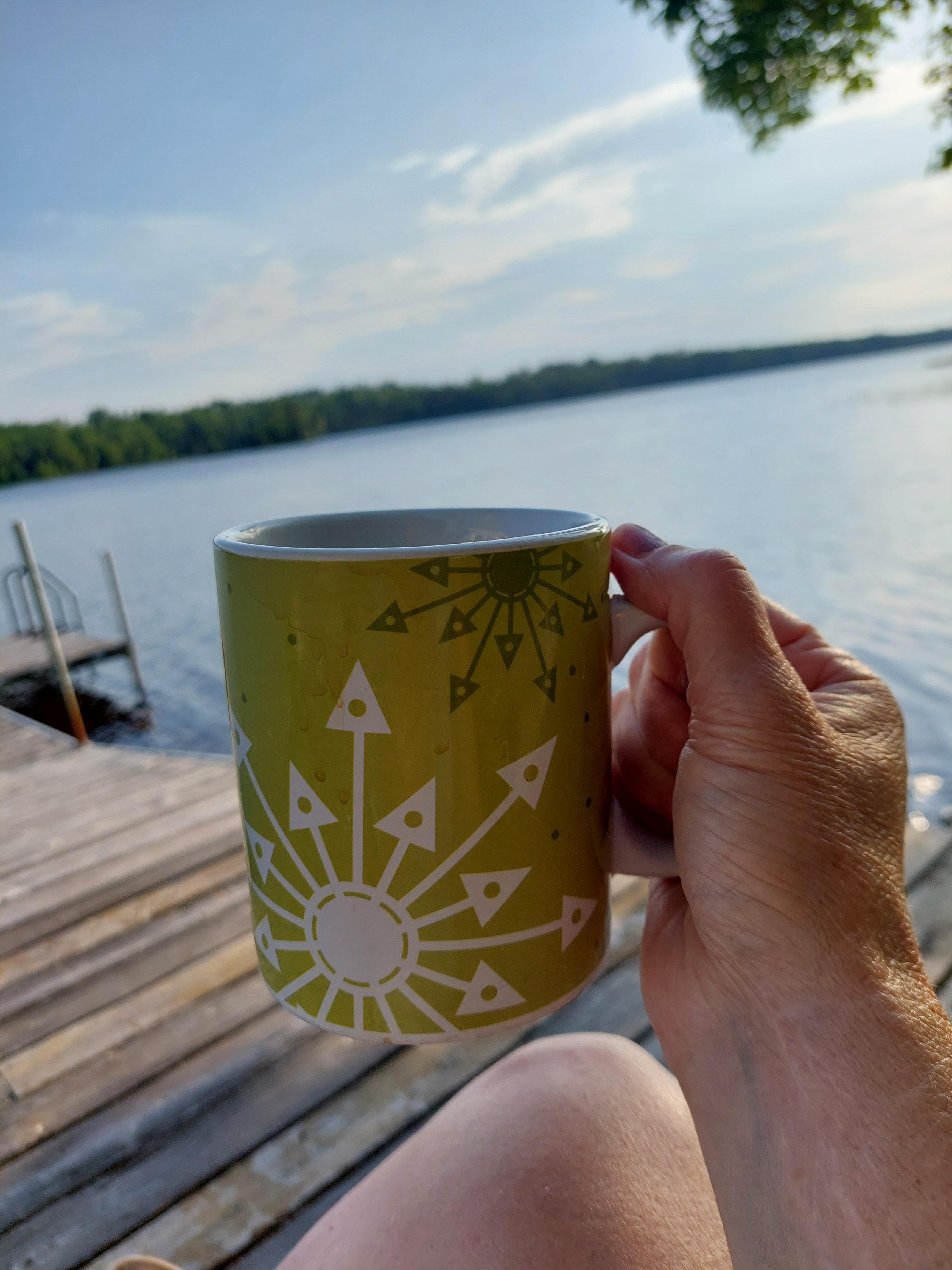 Enjoying coffee on the dock.