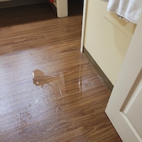 Water on floor from A/C leak. Glad I saw it before We fell!