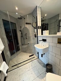 There’s even a hole in the shower panel so you can turn it on to preheat before getting in – amazing!!