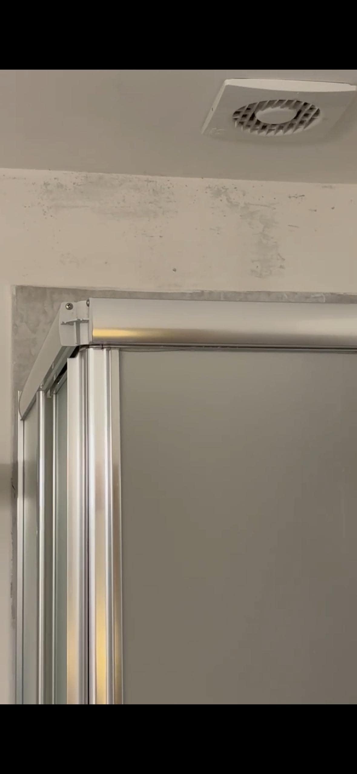 Mold on the walls of the bathroom.