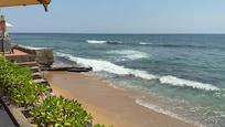 Galle Face Hotel sandy Beach, No swimming in the sea permitted, lots of rocks and waves!