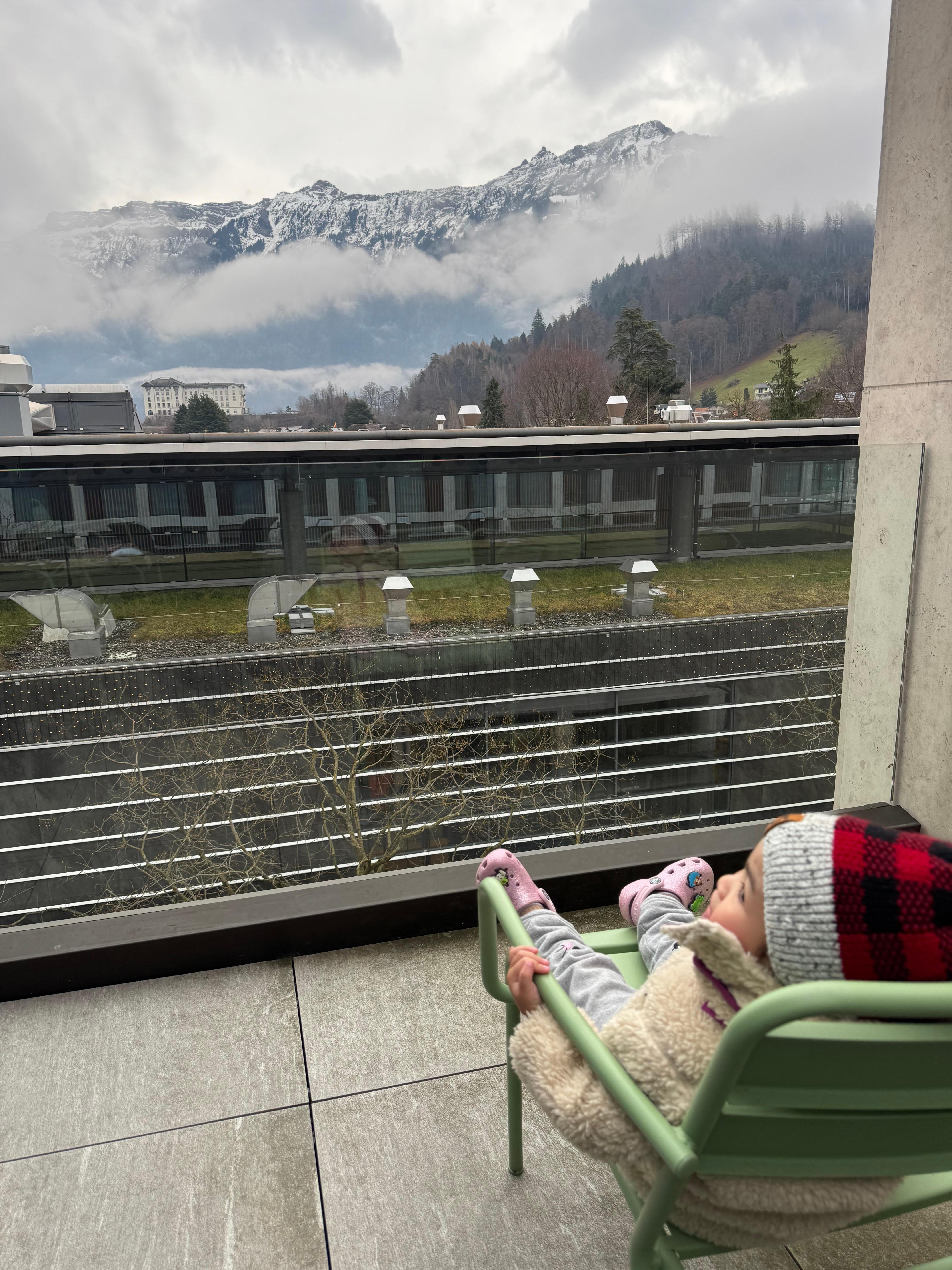 Our baby enjoying the view from our balcony.