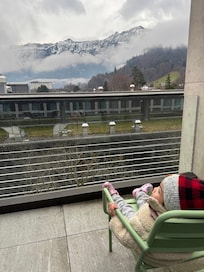 Our baby enjoying the view from our balcony.