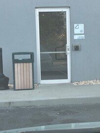 Back door “ADA” access. No ADA parking or step free access.