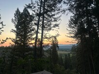 Watching the sunrise on private room balcony.