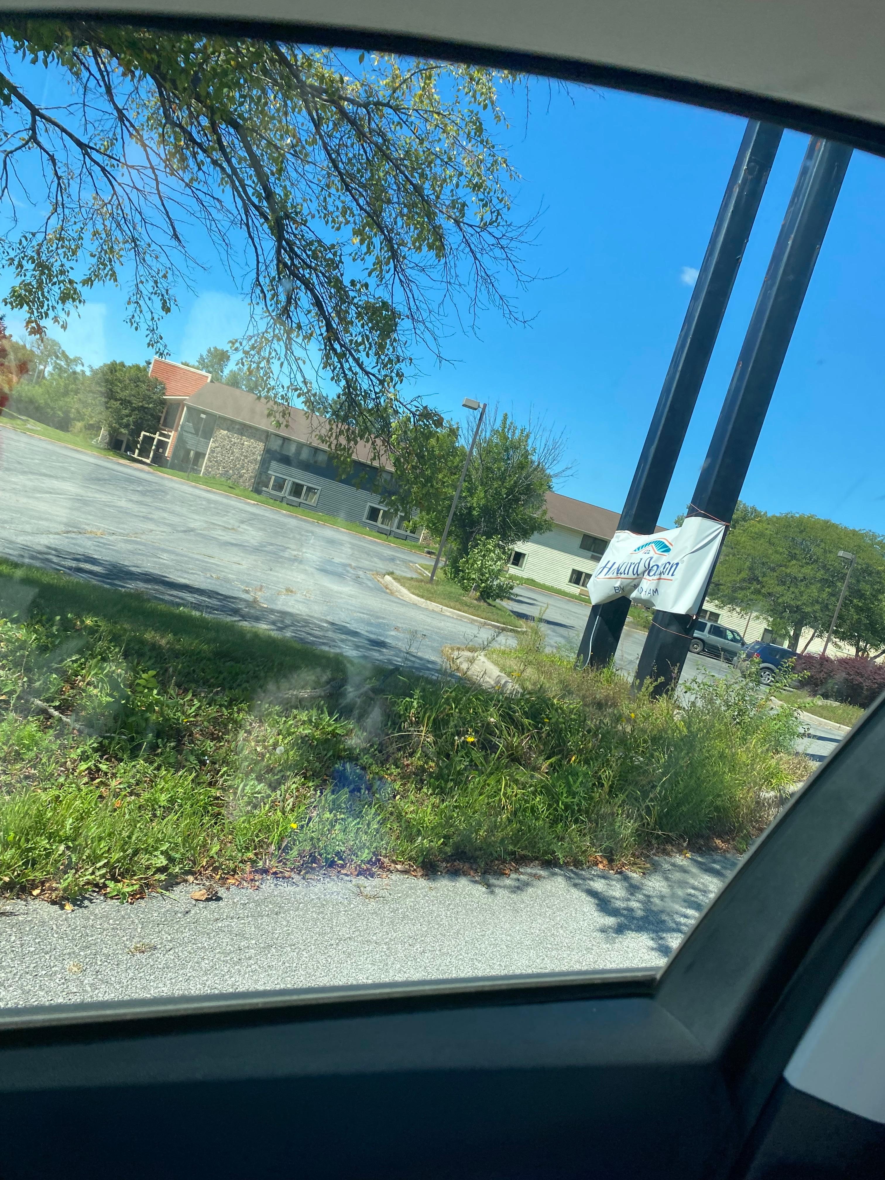 Sign is about to fall off