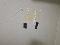 Where the soap dispenser fell and someone tried to glue it
