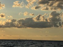Chicago off in the distance. Use the South Shore train to visit downtown Chicago. Itâs easy & drops you off in Millenium Park.
