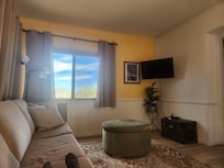 Living area has plenty of comfortable seating.