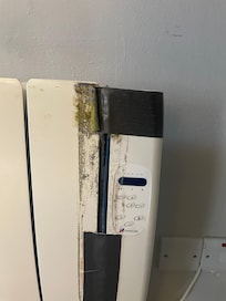 1 of 2 heating units held together by duct tape