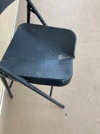 Broken chairs on patio not useable