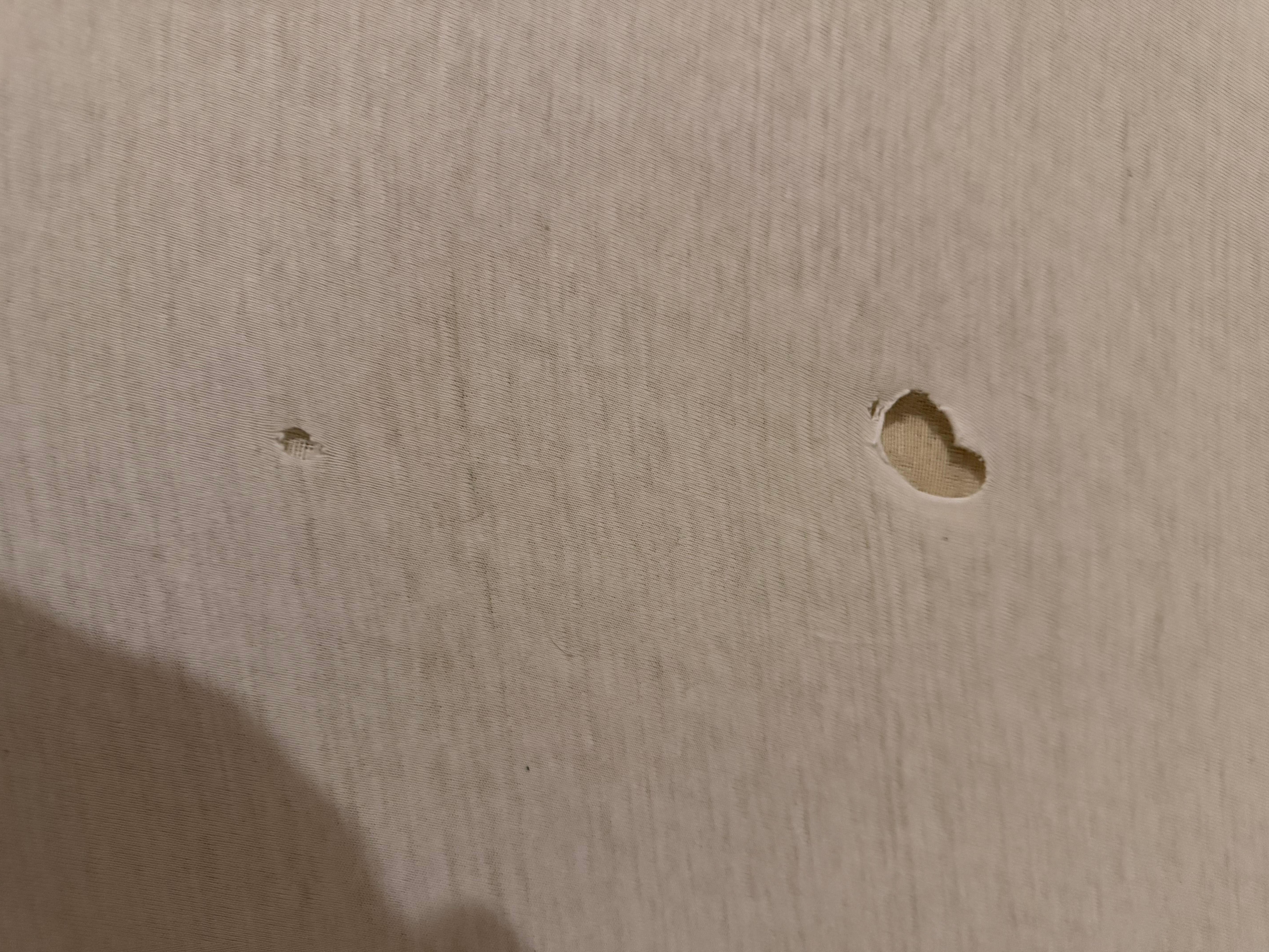 Holes in bedsheet!