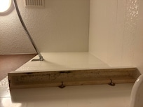 Shelf with mold - bathroom.