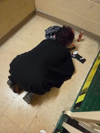 The woman on the stairs at this hotel doing drugs