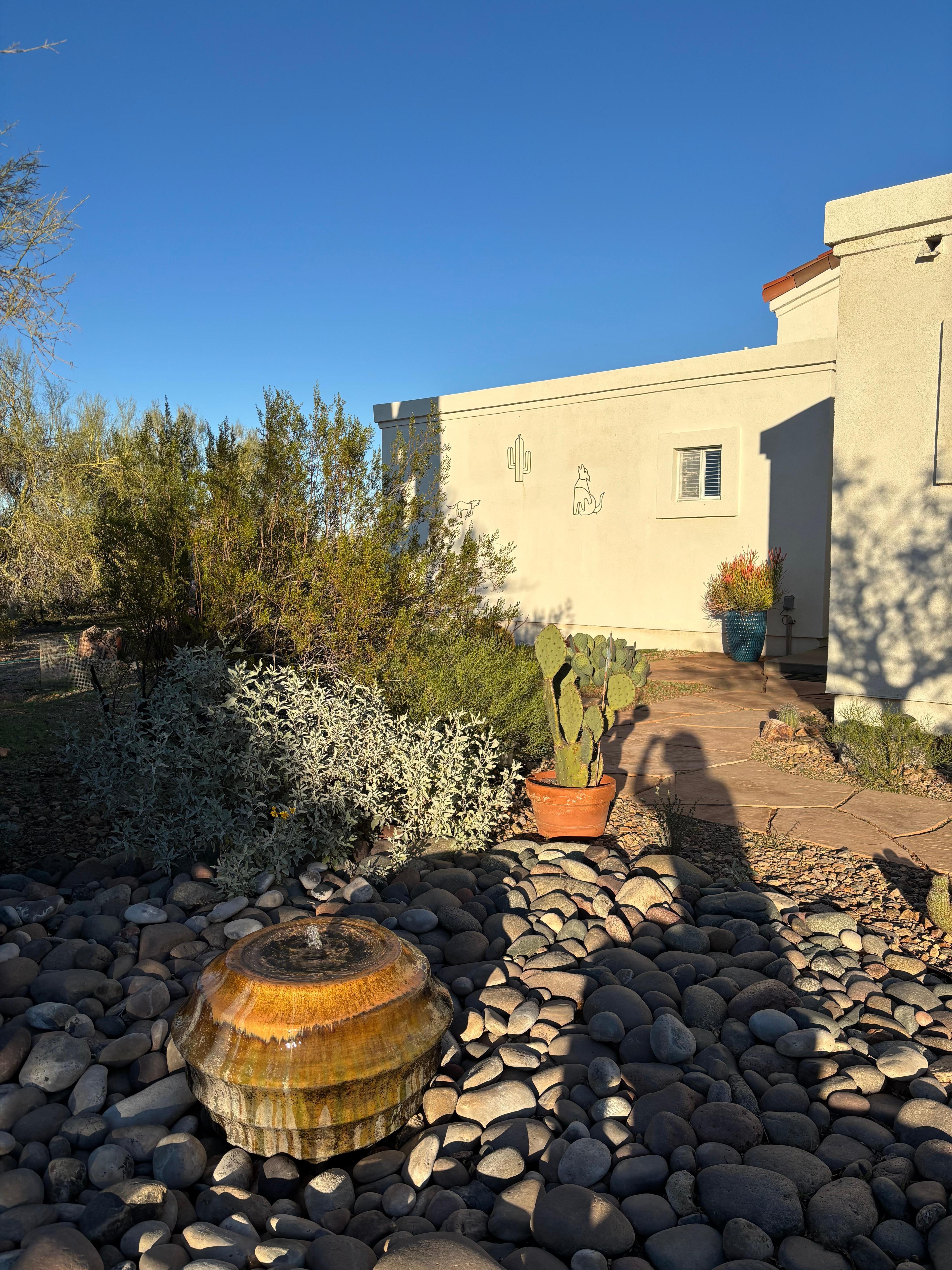 Partial view of house and front landscape