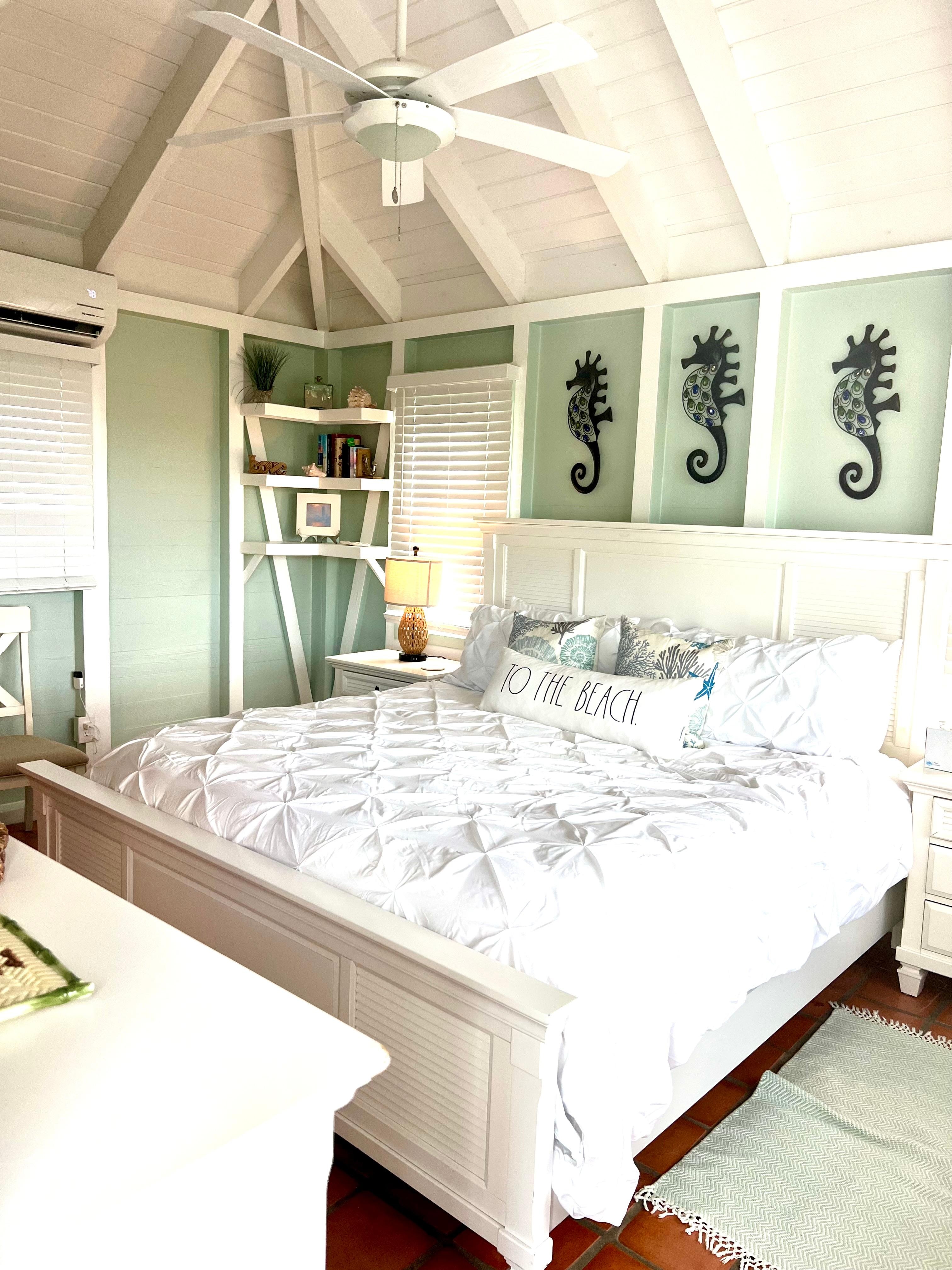 King bedroom on main floor with outdoor shower