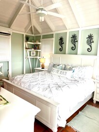 King bedroom on main floor with outdoor shower